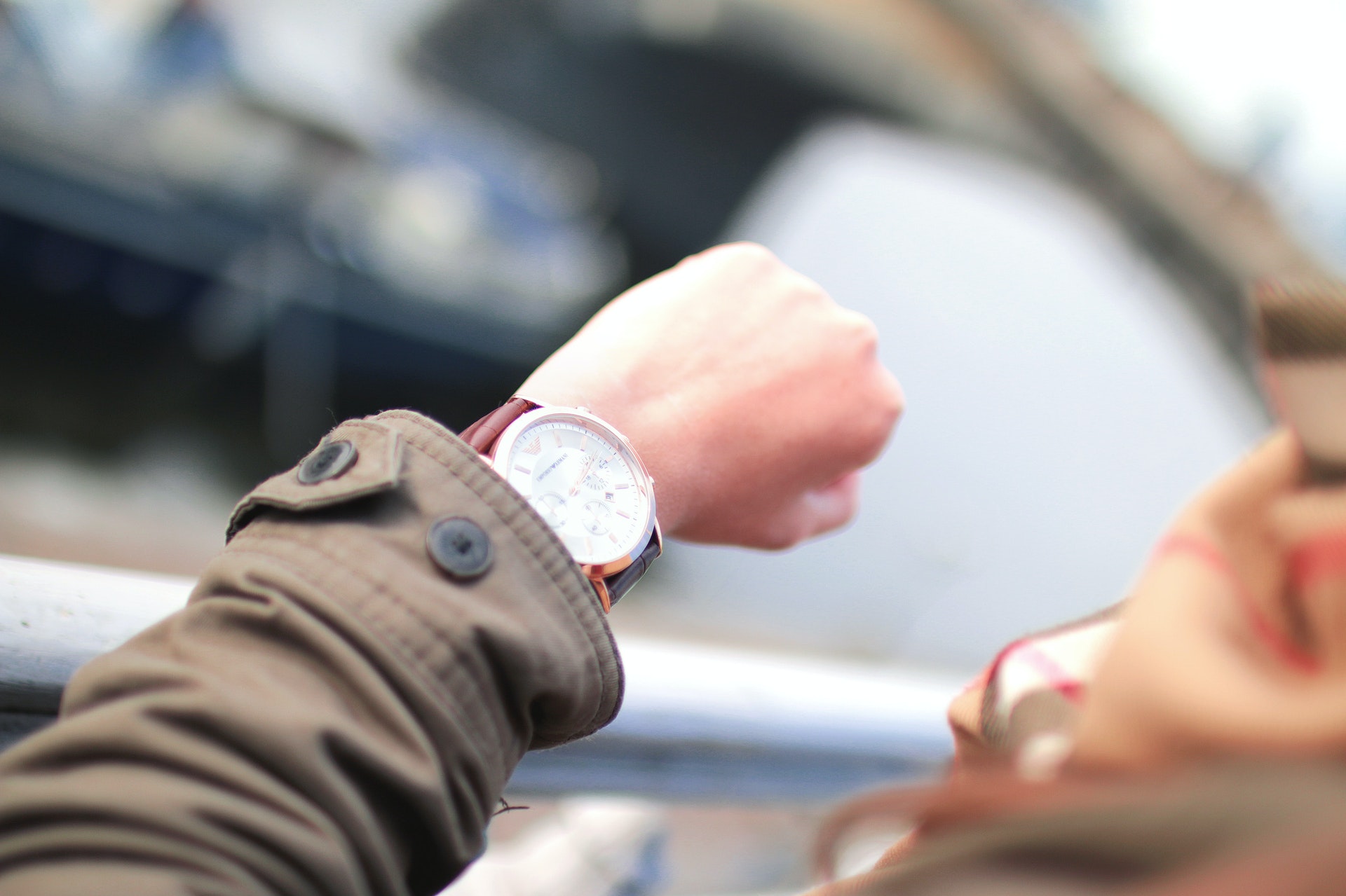 Selective Focus Photography of Person Watching Watch Selective Focus Photography of Person Watching Watch